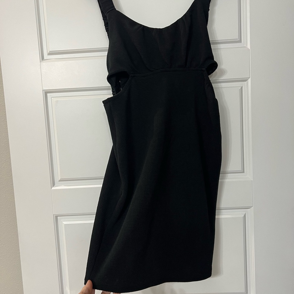Woman’s summer black open back dress